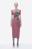 Tiny Ink Mystic Elegance pink midi dress with hand-painted floral design, flowing fabric, and elegant silhouette.