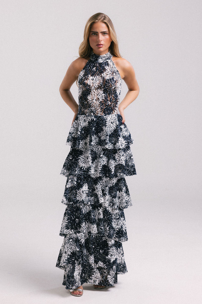 Francisco Arce KEI gown with elegant design, flowing fabric, and intricate details, perfect for formal occasions.