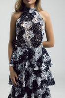 Francisco Arce KEI gown with elegant design, featuring flowing fabric and intricate detailing, ideal for formal occasions