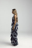 Francisco Arce KEI gown with elegant design, flowing fabric, and intricate details suitable for formal occasions.