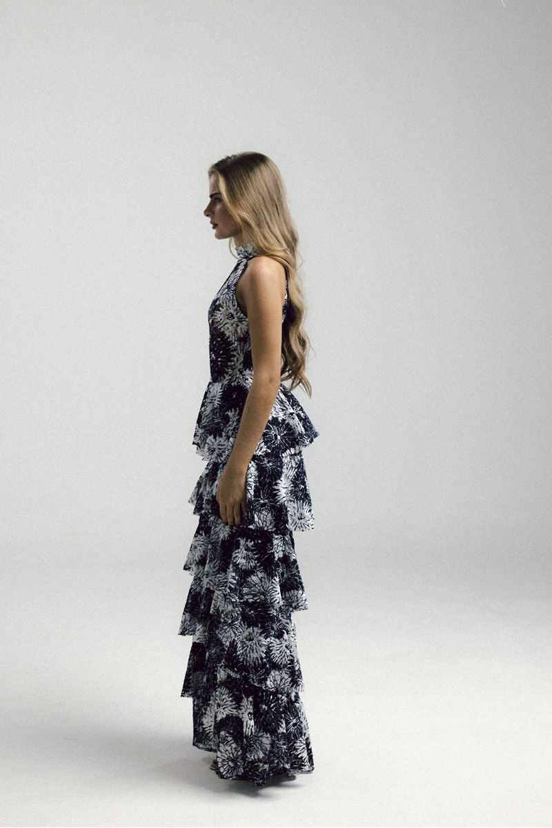 Francisco Arce KEI gown with elegant design, flowing fabric, and intricate details suitable for formal occasions.