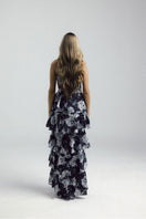 Elegant Francisco Arce KEI gown with intricate detailing, flowing fabric, and a sophisticated design for formal occasions.