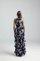 Elegant KEI dress gown by Francisco Arce featuring flowing fabric and intricate detailing, perfect for formal occasions.