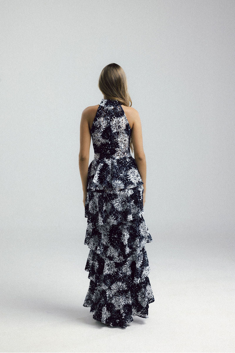 Elegant KEI dress gown by Francisco Arce featuring flowing fabric and intricate detailing, perfect for formal occasions.