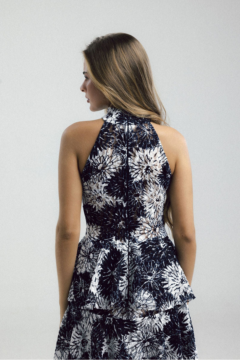 Elegant KEI dress gown by Francisco Arce featuring intricate detailing and flowing fabric, perfect for formal occasions.