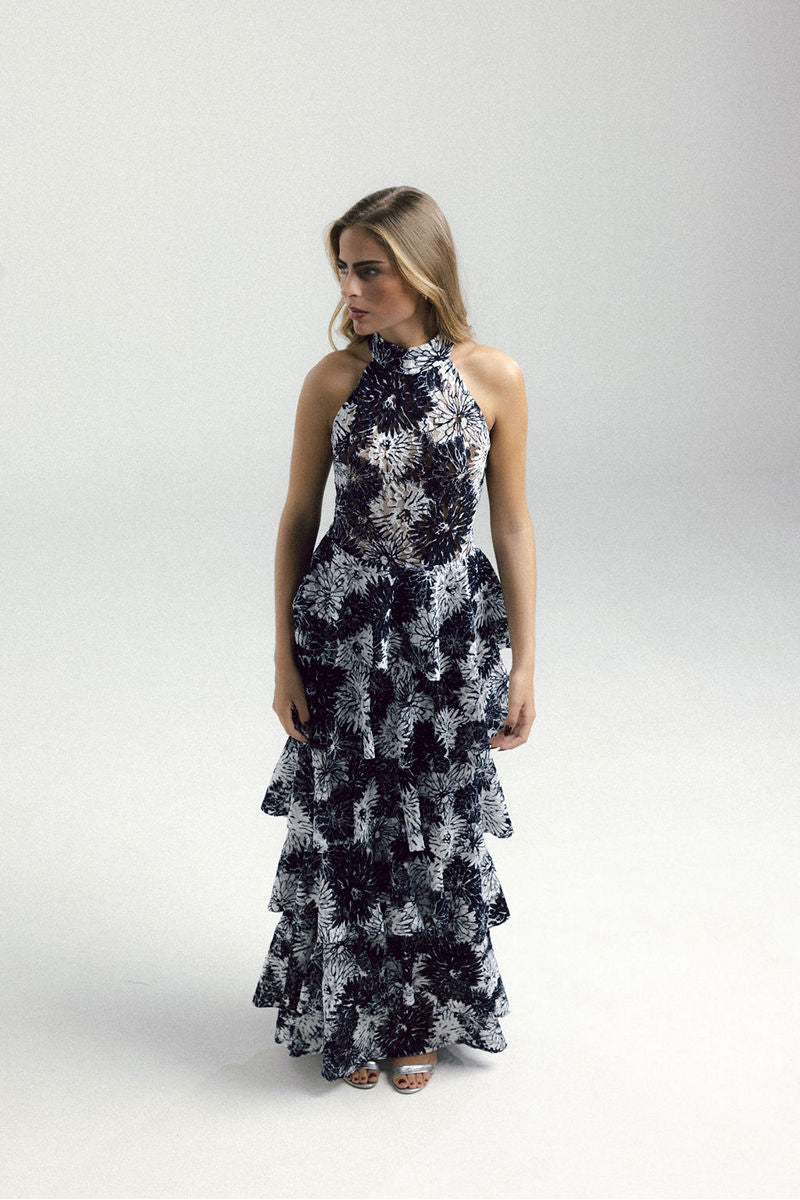 Francisco Arce KEI gown with elegant design, flowing fabric, and intricate detailing, perfect for formal occasions.