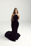 Black VEYA gown by Francisco Arce, elegant floor-length dress with a sleek silhouette and stylish design.
