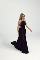 Black VEYA gown by Francisco Arce featuring elegant fabric and stylish design, perfect for formal occasions.