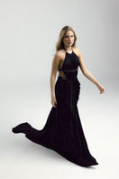Black Veya dress by Francisco Arce, elegant gown with flowing fabric and stylish design, perfect for formal occasions.