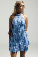 Floral print Francisco Arce mini dress with short sleeves and fitted waist, displayed on a hanger against a white background.