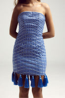 Francisco Arce SENA DRESS mini dress featuring a stylish design, displayed on a hanger with a vibrant, modern fabric pattern.