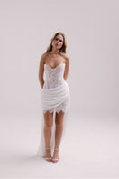 Francisco Arce LUMI mini dress featuring a stylish design, fitted silhouette, and elegant fabric for fashionable daytime wear.