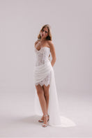 Francisco Arce LUMI mini dress featuring a stylish, fitted design with vibrant fabric and elegant detailing.