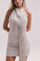 Francisco Arce LIOR mini dress featuring a stylish, fitted silhouette with a vibrant pattern and sleeveless design.