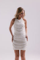 Francisco Arce Lume Dress mini dress in vibrant fabric, featuring a fitted silhouette and stylish design.