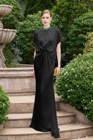 Black mermaid gown with high neck and gathered waist from I.H.F, featuring a fitted silhouette and elegant design.