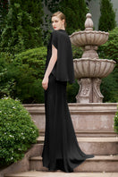 Black I.H.F mermaid gown with high neck and gathered waist, elegant formal dress with fitted silhouette and flowing fabric.