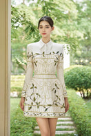 Rosee de Matin Blair mini dress with an A-line silhouette, collared neck, and polyester cotton fabric, shown in a stylish design.