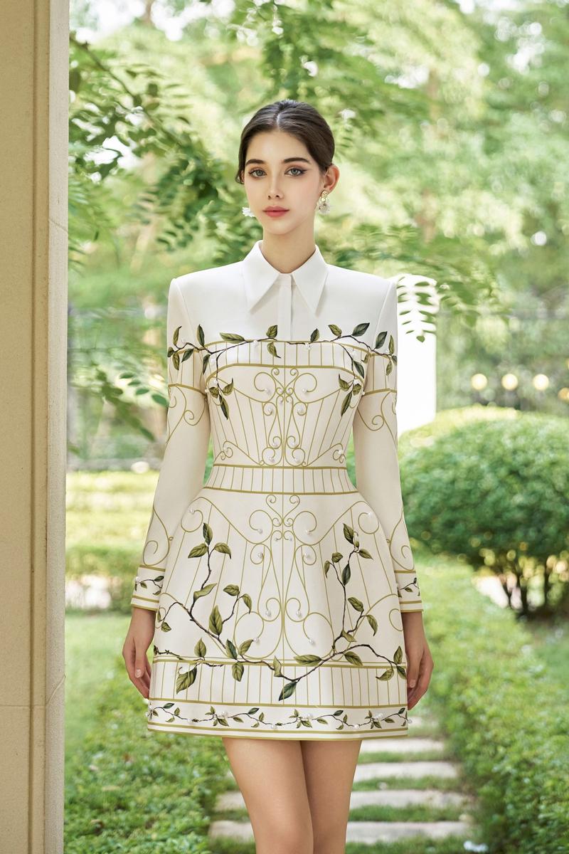Rosee de Matin Blair mini dress with an A-line silhouette, collared neck, and polyester cotton fabric, shown in a stylish design.