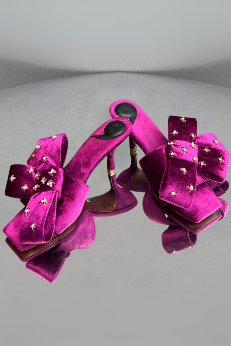 Pink Raina bow heels by Christin Wu featuring a stylish bow detail and sleek heel design.