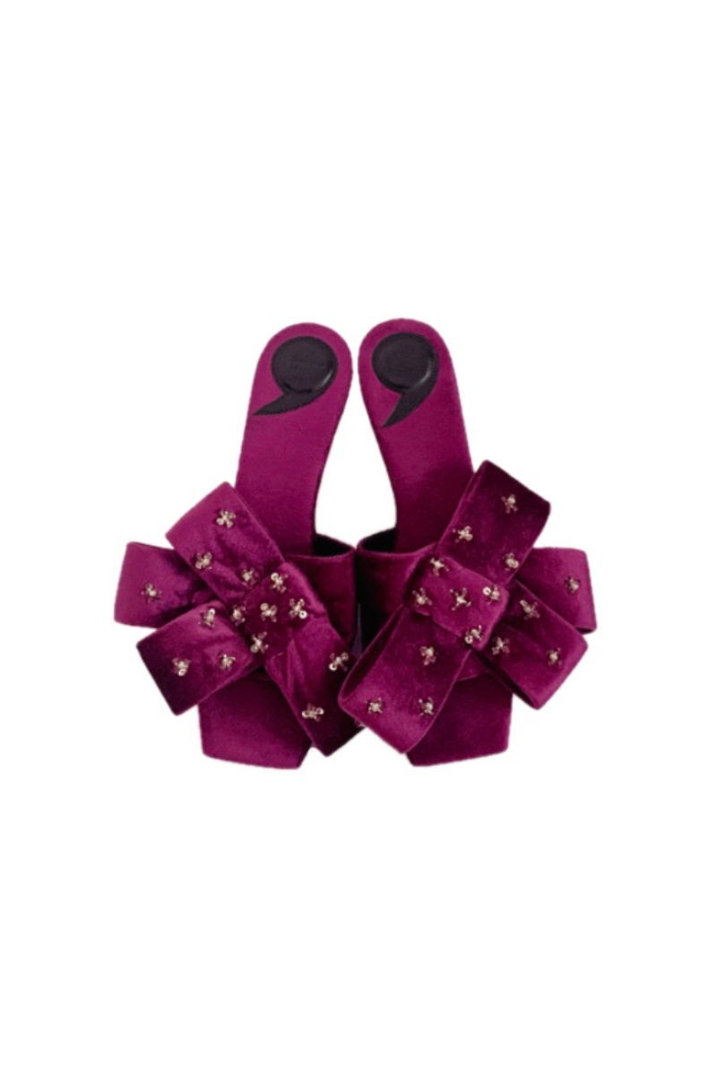 Christin Wu Raina Fuchsia bow heels showing pink satin shoes with bow detail and sleek heel design.
