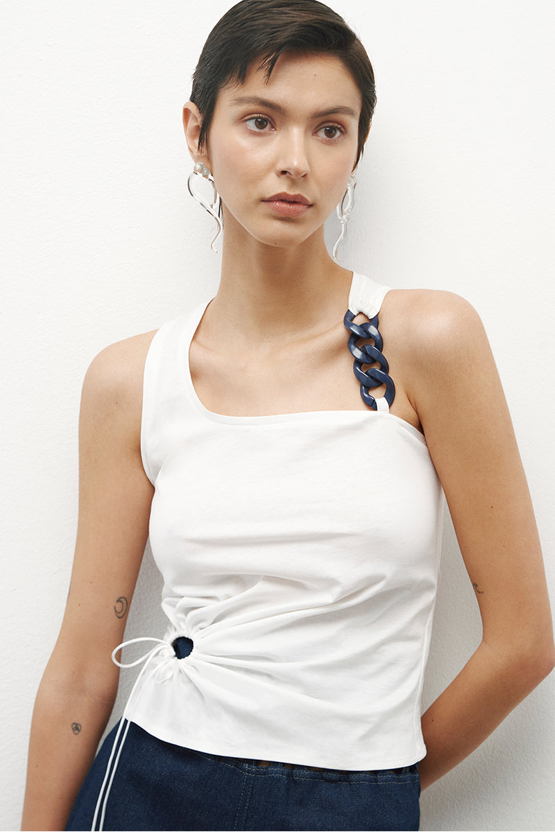 Recycled cotton top by JC Pajares, showcasing a stylish, eco-friendly women's top with a relaxed fit and natural fabric texture.