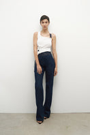 JC Pajares denim jeans with chains at the waist, showcasing a stylish fit and detailed chain accessories.