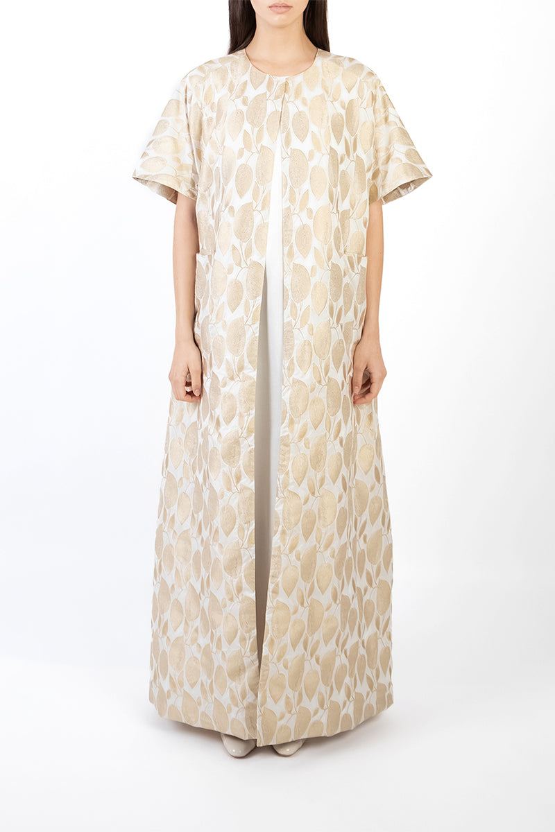 Shatha Essa gold coat dress featuring a stylish front view, elegant design, and sleek fabric for a sophisticated look.