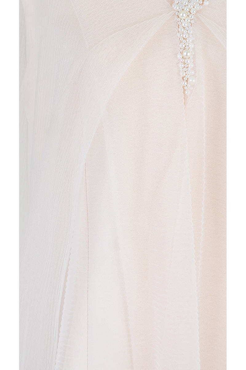 Pearl-embellished drape detail gown by Shatha Essa, featuring elegant flowing fabric and intricate pearl accents.