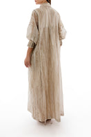 Back view of SHATHA ESSA floral embroidered oversized maxi shirt dress with an inner dress, showcasing intricate embroidery and flowing fabric.