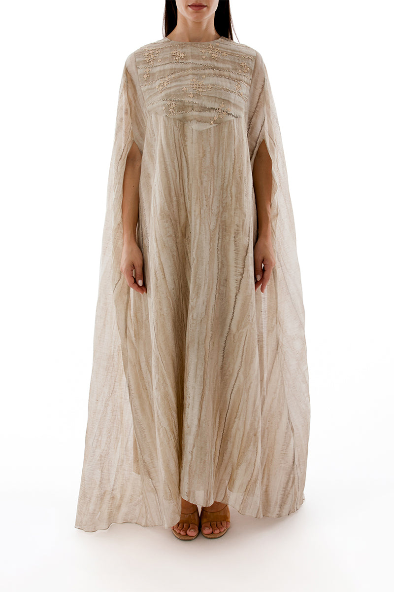 Embroidered crew neck caftan gown with matching inner dress by Shatha Essa, featuring intricate embroidery and flowing fabric.