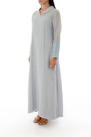 Embroided side slit detail maxi dress with inner dress by Shatha Essa, flowing fabric and elegant embroidery.