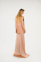 Mastani Reez Silk Gilet in nude color, sleeveless vest with smooth silk fabric, styled over a top for a chic look