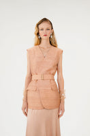 Mastani Reez Silk Gilet in nude, stylish sleeveless vest with smooth silk fabric, displayed on a neutral background.