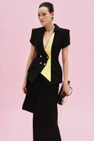 Jenny K Tran Reigate blazer jacket, tailored fit with classic lapels, stylishly displayed on a hanger.