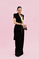 Jenny K Tran Reigate blazer jacket displayed on a hanger, showcasing tailored fit and classic design.