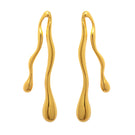 Gold earrings with a sleek, modern design from Eugenia Ospina's Respira collection, shown in a close-up image.