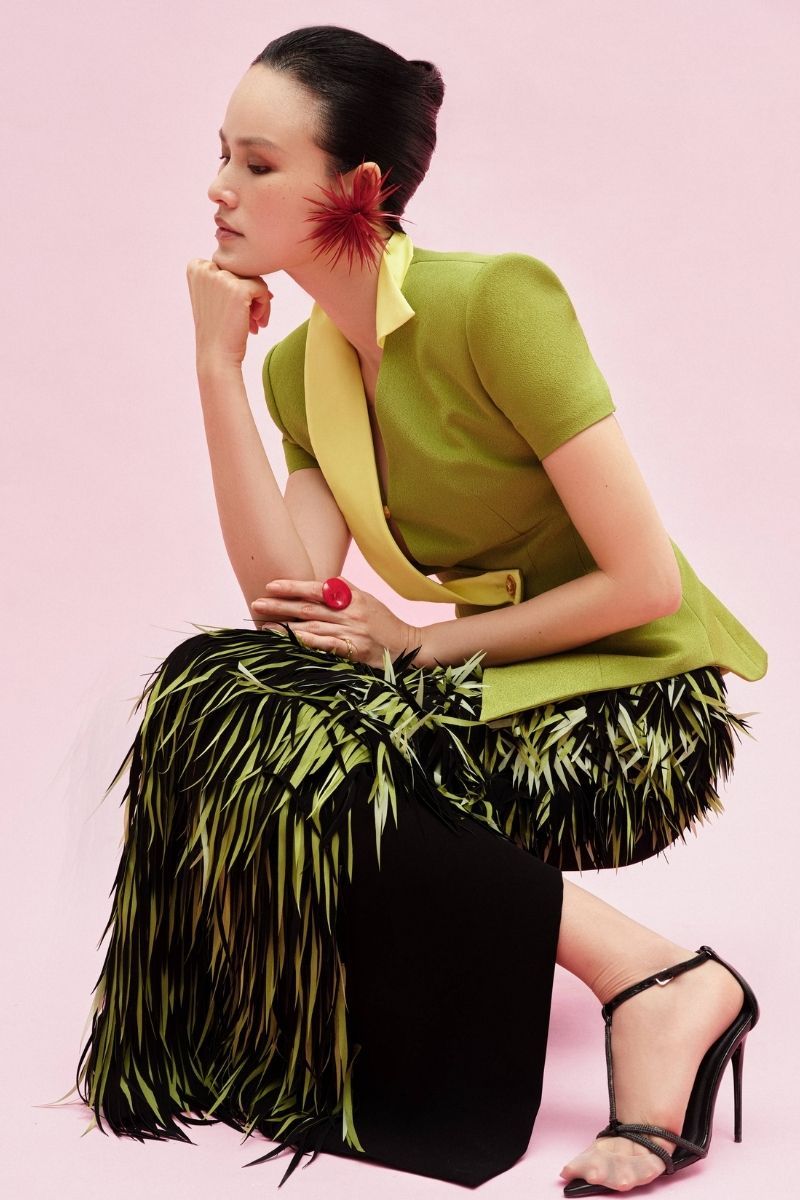 Elegant green maxi skirt by Jenny K Tran, featuring flowing fabric and a stylish design for casual or dressy occasions.