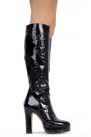 Black River Gloss boots by Terry de Havilland featuring a sleek, shiny leather finish and stylish ankle-high design.