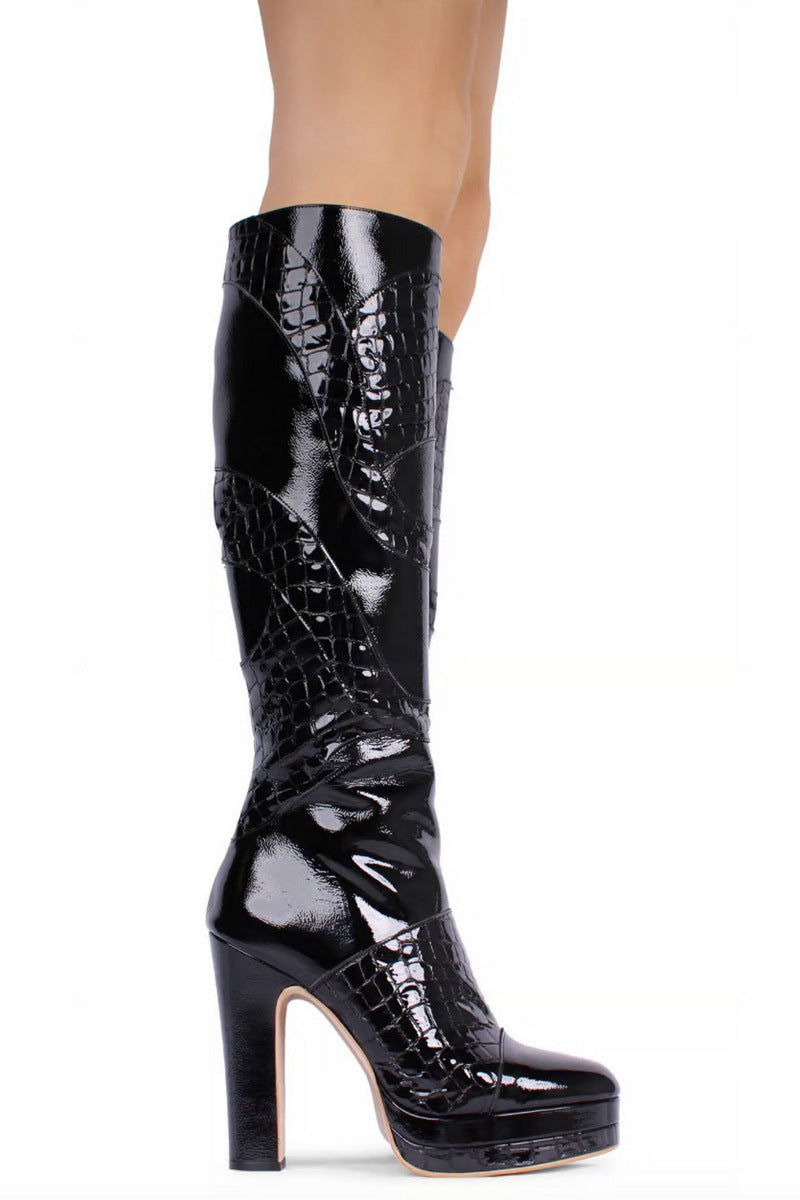 Black River Gloss boots by Terry de Havilland featuring a sleek, shiny leather finish and stylish ankle-high design.