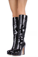 Black River Gloss Boots by Terry de Havilland featuring a sleek, high-shine finish and stylish ankle-high design.