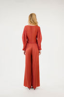 Maroon silk pants from Mastani's Sufia Silk Pant collection, styled with a matching Rohi top in berry color.