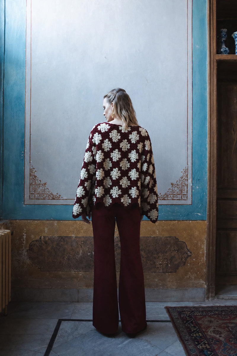 Jessica K burgundy and beige Rosa cardigan, soft knit with button details, styled on a model.