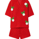 Jessica K ROSARA red co-ord set featuring a knitted top and matching bottoms, styled for a trendy, coordinated look.
