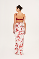 Aguaclara Rouge Pareo Sarong in vibrant printed fabric, featuring a stylish cover-up with flowing fabric and colorful patterns.