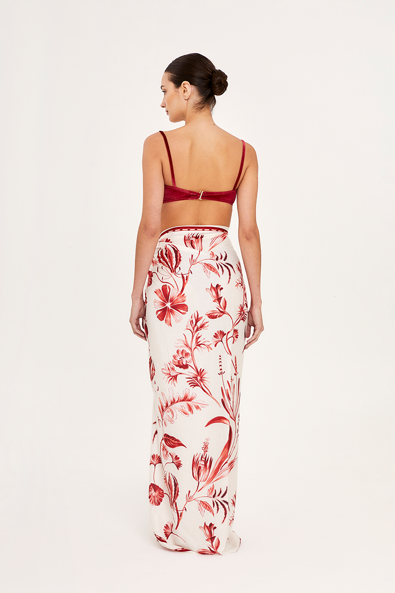 Aguaclara Rouge Pareo Sarong in vibrant printed fabric, featuring a stylish cover-up with flowing fabric and colorful patterns.