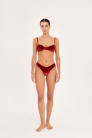 Red Aguaclara Rouge bandeau bikini top with adjustable straps, featuring a sleek, vibrant design perfect for beach or pool wear.