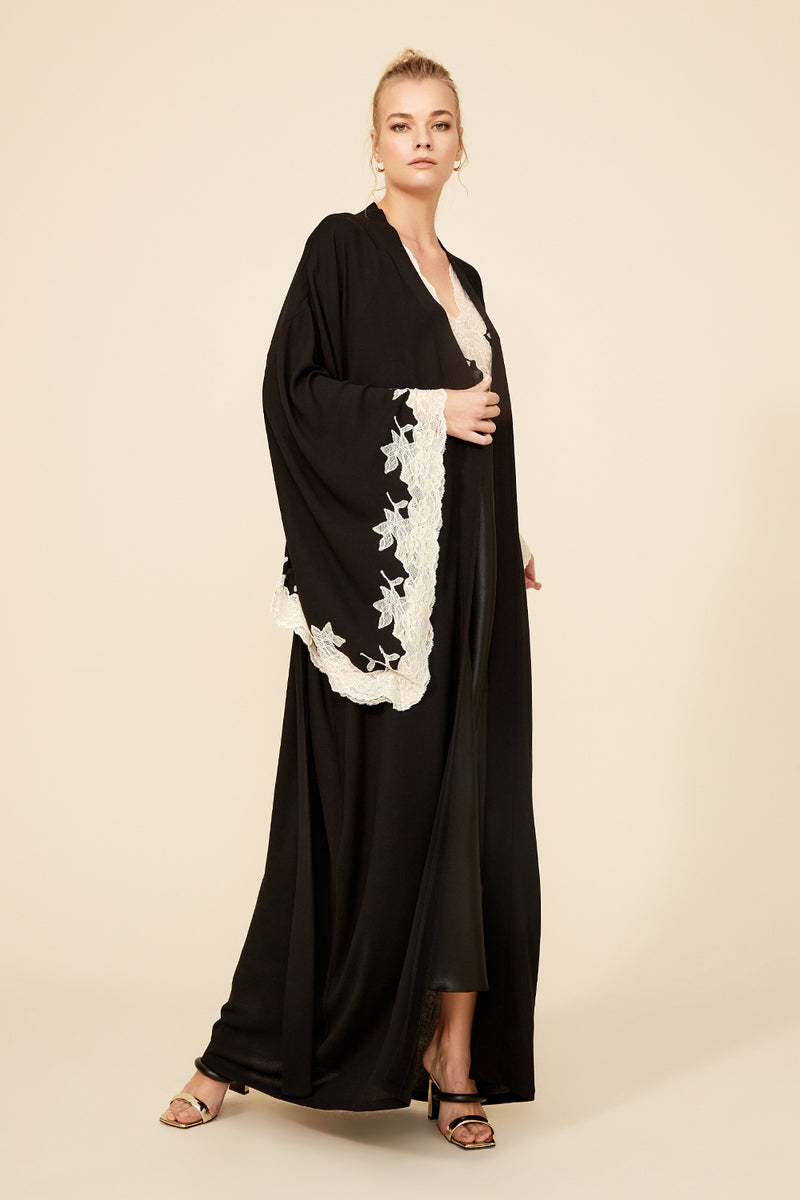 Anastasia long black kimono robe by Bocan Couture with gold lace details, flowing fabric, and elegant design.