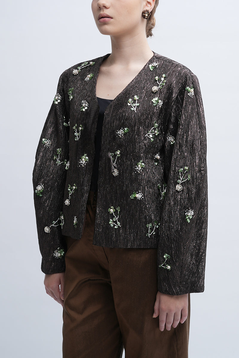 Aidan & Ice Louisa jacket in stylish fabric, featuring a tailored fit and modern design, displayed on a hanger.