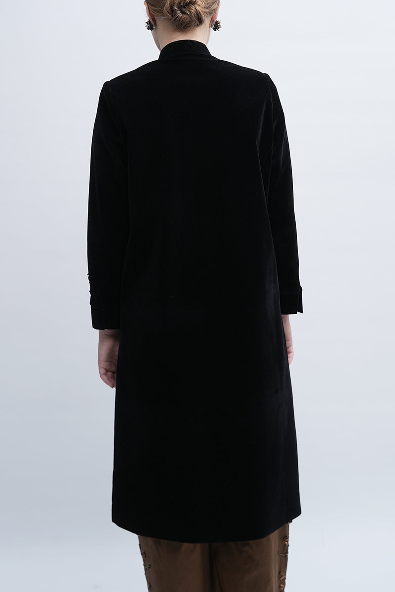 Aidan & Ice Nocturne Coat in dark fabric, stylish long coat with a tailored fit and classic collar, displayed on a hanger.